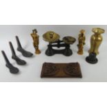 A box of items to include sets of scales and weights along with a book slide and a brass vase.