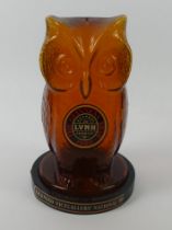 An amber glass owl money box, produced by Guinness in 1980 to support the Licensed Victuallers