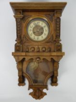 A Victorian eight day wall clock, 78cm x 37cm.