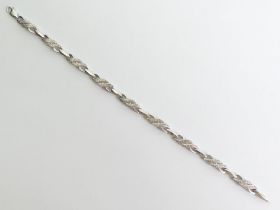 Silver and diamond bracelet, 8.5 grams, 5.2mm, 19cm long.