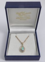 9ct gold opal and diamond pendant and chain, 4.9 grams, pendant 18.5mm, chain 46cm.