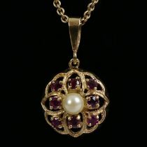 9ct gold, ruby and cultured pearl pendant and chain, 8.1 grams, pendant 16.3mm diameter, chain 46cm.