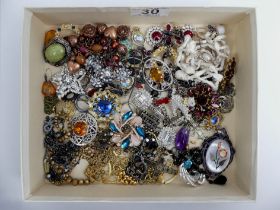 A box of mixed costume jewellery including silver gem set rings.