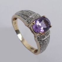 9ct gold amethyst and diamond ring, 3.1 grams, 8.1mm, size O.