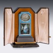 A FINE EARLY 20TH CENTURY SWISS SOLID SILVER AND GUILLOCHE ENAMEL TRAVEL CLOCK IN DISPLAY CASE