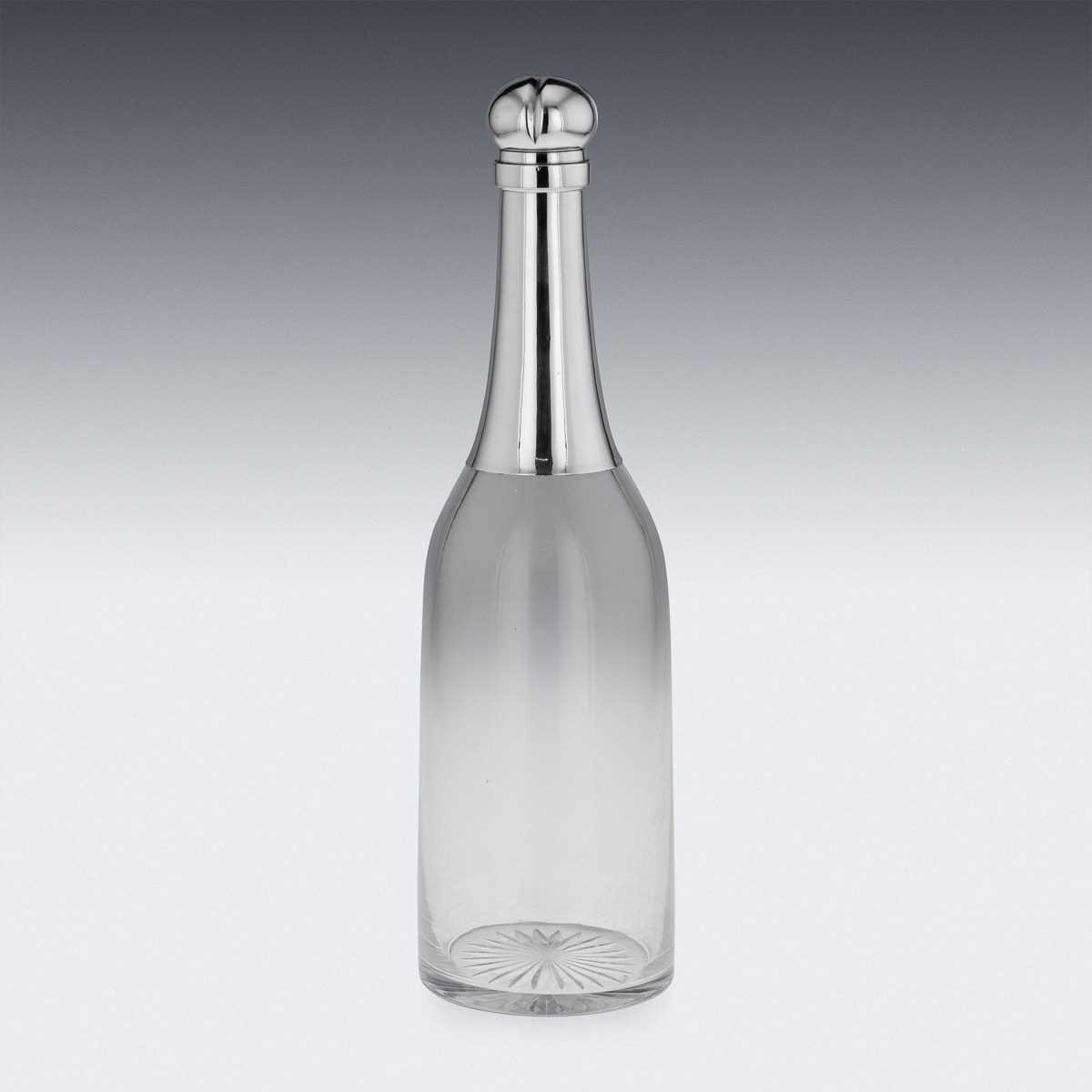 A 19TH CENTURY STERLING SILVER AND GLASS 'CHAMPAGNE BOTTLE' DECANTER C. 1895 - Image 12 of 14