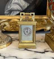 A LATE 19TH CENTURY FRENCH GILT BRASS MINIATURE REPEATING CARRIAGE CLOCK BY GAY, LAMAILLE & CO.