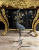 A MEIJI PERIOD LIFE SIZE BRONZE MODEL OF A RED-CROWNED CRANE