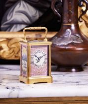 A LATE 19TH CENTURY FRENCH GILT BRASS AND PINK PORCELAIN CARRIAGE CLOCK