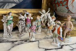 SEVEN 19TH CENTURY KPM BERLIN PORCELAIN FIGURES TOGETHER WITH TWO OTHERS