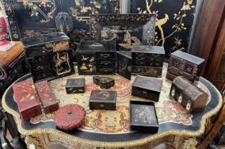 A COLLECTION OF 19TH CENTURY JAPANESE AND CHINESE LACQUERED BOXES AND TABLE CABINETS