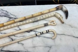 FOUR LATE 19TH / 20TH CENTURY INDIAN CARVED BONE WALKING CANES