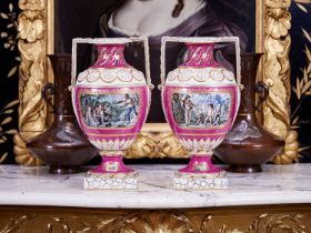 A RARE PAIR OF EARLY 19TH CENTURY BERLIN PORCELAIN COMPANY VASES WITH ABOLITIONIST SCENES
