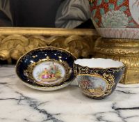 MEISSEN: A MID 19TH CENTURY PORCELAIN CUP AND SAUCER