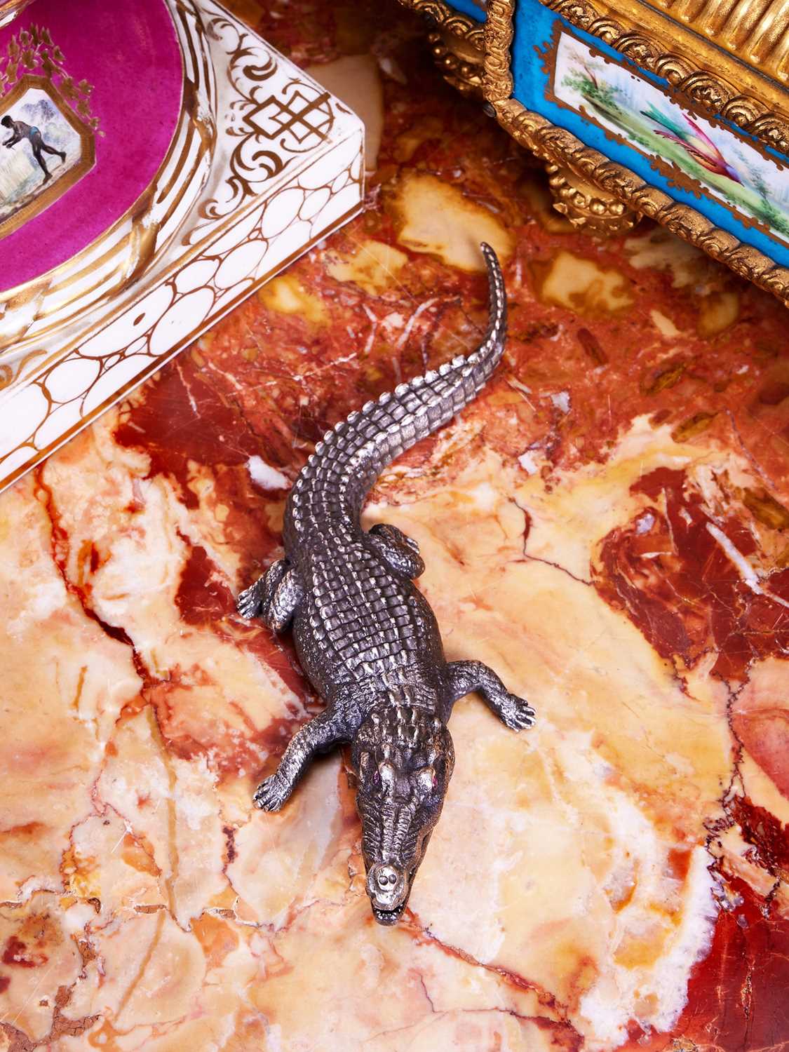 A FABERGE STYLE SOLID SILVER MODEL OF A CROCODILE