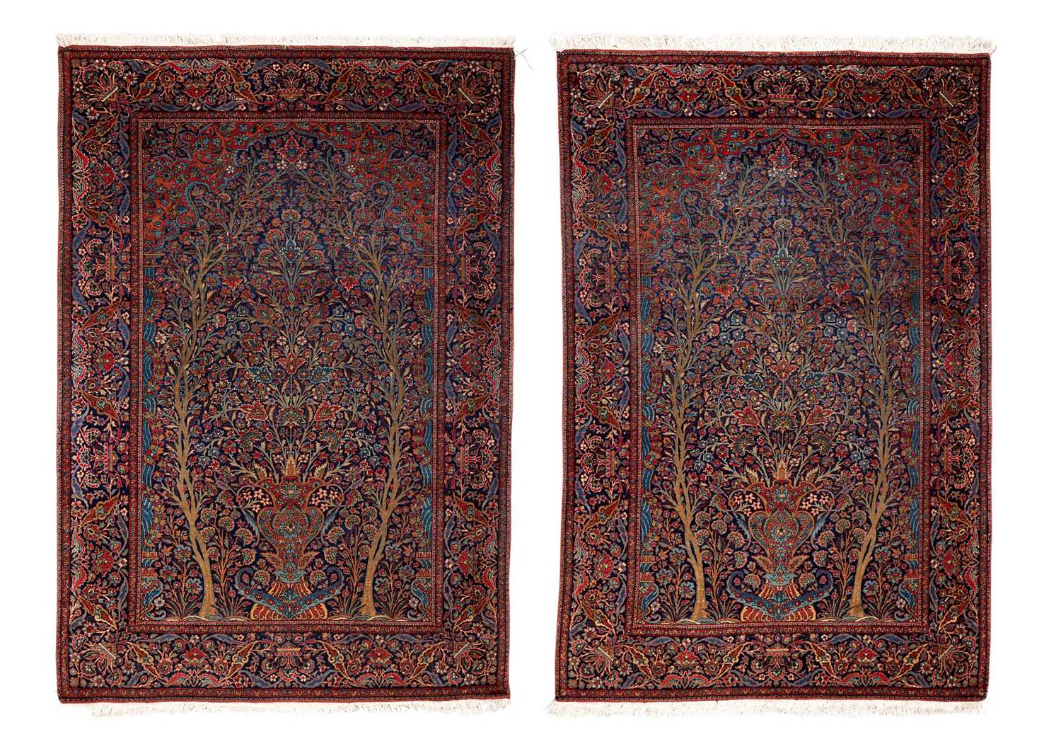 A FINE PAIR OF 1920'S PERSIAN CARPETS