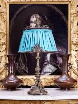 A LOUIS XVI STYLE BRONZE LAMP BASE MODELLED WITH CHERUBS