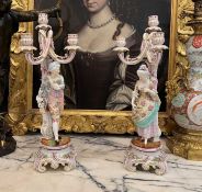 A PAIR OF 19TH CENTURY DRESDEN PORCELAIN FIGURAL CANDELABRA