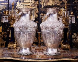 A MASSIVE PAIR OF SILVER VASES, PROBABLY ITALIAN, 1960'S