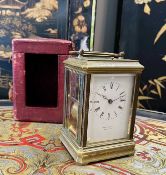 A LATE 19TH CENTURY FRENCH GILT BRASS STRIKING CARRIAGE CLOCK WITH PUSH REPEAT