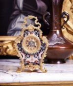 A LATE 19TH CENTURY FRENCH GILT BRONZE AND CLOISONNE ENAMEL MANTEL CLOCK