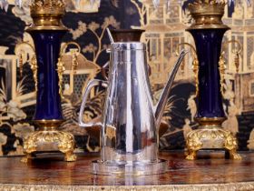 GERALD BENNEY: A STERLING SILVER COFFEE POT ON STAND CIRCA 1965
