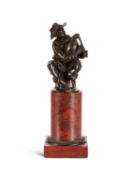 AFTER GIAMBOLOGNA (ITALIAN, 1529-1608): A BRONZE FIGURE OF A SEATED BAGPIPER