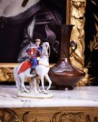 MEISSEN: A FINE 19TH CENTURY PORCELAIN MODEL OF A HuSSAR ON HORSEBACK
