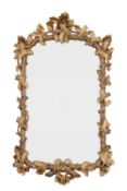 A REGENCY STYLE WALL MIRROR DECORATED WITH OAK LEAVES