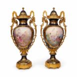 A MONUMENTAL PAIR OF LATE 19TH / EARLY 20TH CENTURY SEVRES STYLE PORCELAIN AND ORMOLU MOUNTED VASES