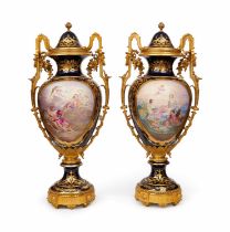 A MONUMENTAL PAIR OF LATE 19TH / EARLY 20TH CENTURY SEVRES STYLE PORCELAIN AND ORMOLU MOUNTED VASES