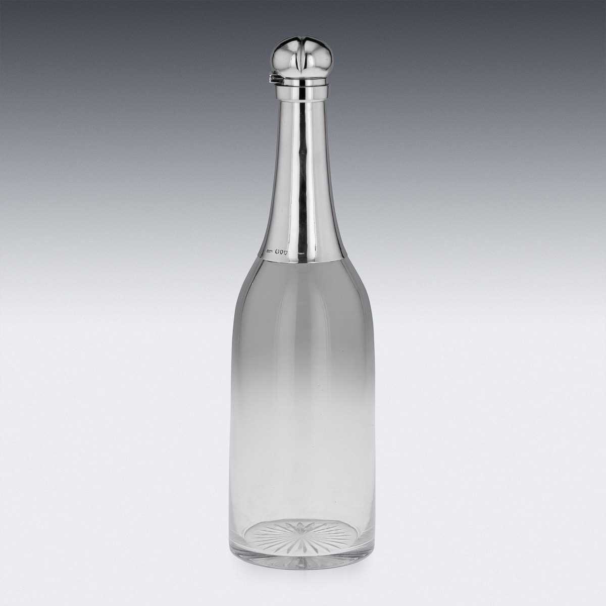 A 19TH CENTURY STERLING SILVER AND GLASS 'CHAMPAGNE BOTTLE' DECANTER C. 1895 - Image 3 of 14