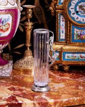 A FABERGE STYLE SILVER AND GLASS VASE DECORATED WITH MONKEYS IN DISPLAY CASE