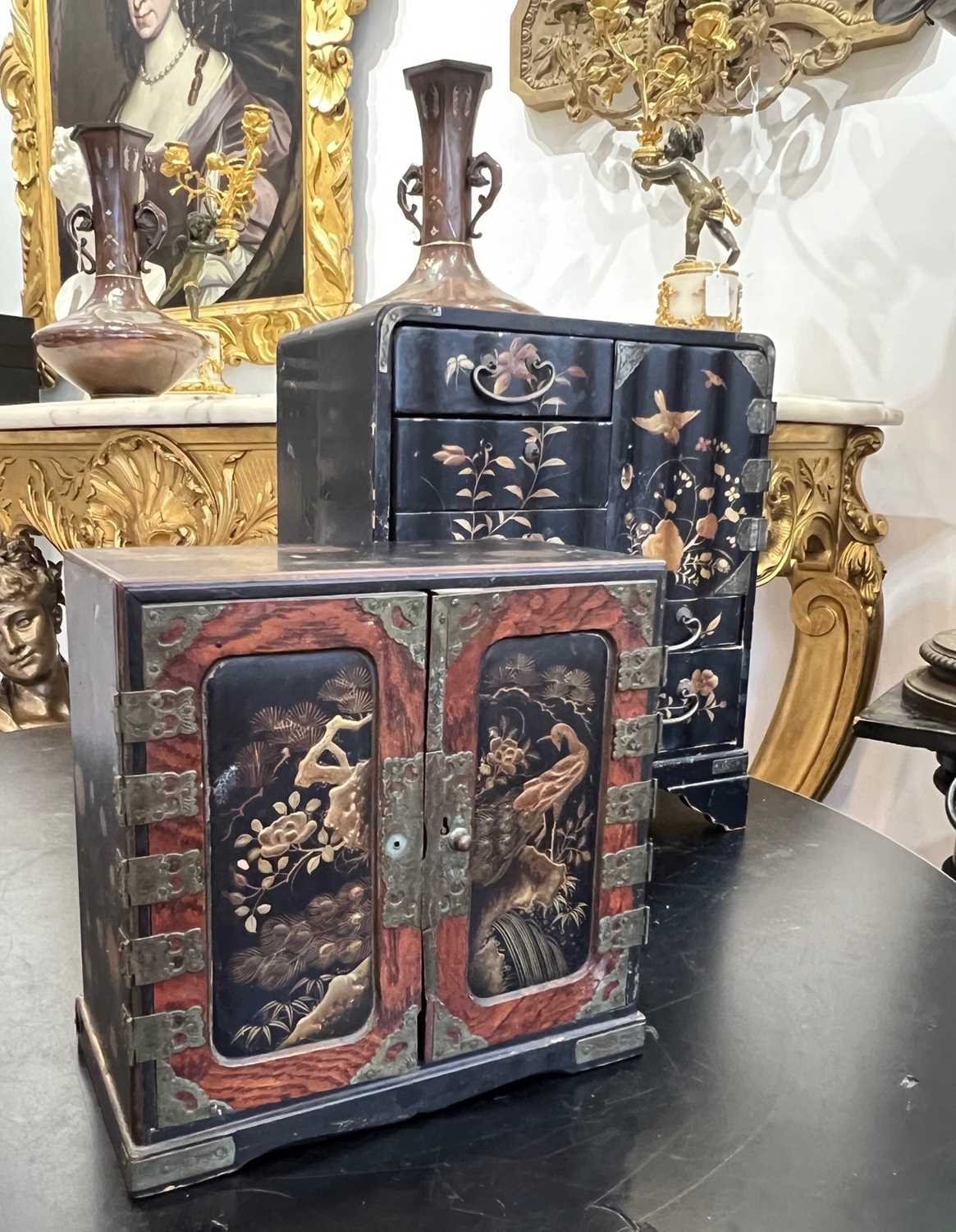 TWO LATE 19TH CENTURY JAPANESE LACQUERED AND GILT DECORATED MINIATURE TABLE CABINETS