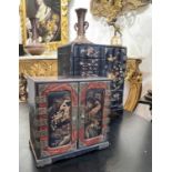 TWO LATE 19TH CENTURY JAPANESE LACQUERED AND GILT DECORATED MINIATURE TABLE CABINETS
