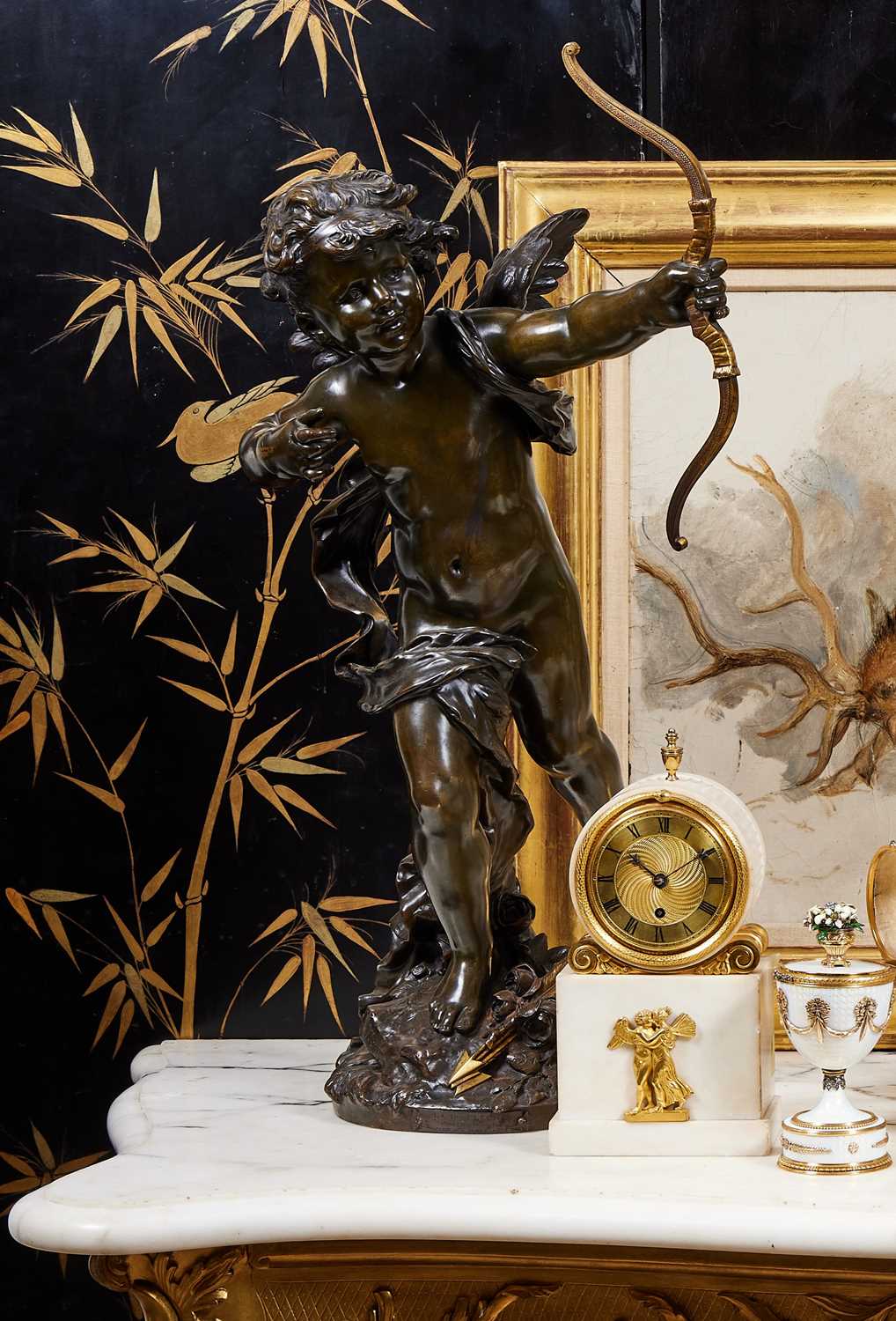 AUGUSTE MOREAU (FRENCH, 1834-1917): A LARGE BRONZE FIGURE OF CUPID WITH HIS BOW