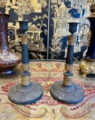 A PAIR OF SECOND QUARTER 19TH CENTURY FRENCH GILT AND PATINATED BRONZE CANDLESTICKS
