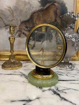 A SMITH'S ELECTRIC MYSTERY CLOCK ON ONYX BASE