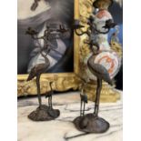 A PAIR OF LATE 19TH CENTURY BRONZE STORK CANDELABRA