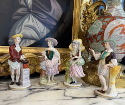 A SET OF FOUR 19TH CENTURY CAPODIMONTE PORCELAIN FIGURES