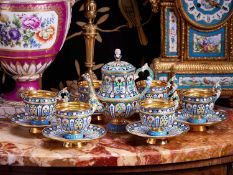 A FINE SOLID SILVER GILT AND ENAMEL TEA SET IN MANNER OF OVCHINNIKOV