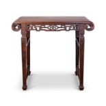 A LATE 19TH CENUTRY CHINESE CARVED HARDWOOD ALTAR TABLE