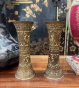 A PAIR OF ENGRAVED BRASS VASES IN THE MEDIEVAL STYLE