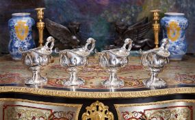 A SET OF FOUR 18TH CENTURY STERLING SILVER SAUCE BOATS, C. 1763