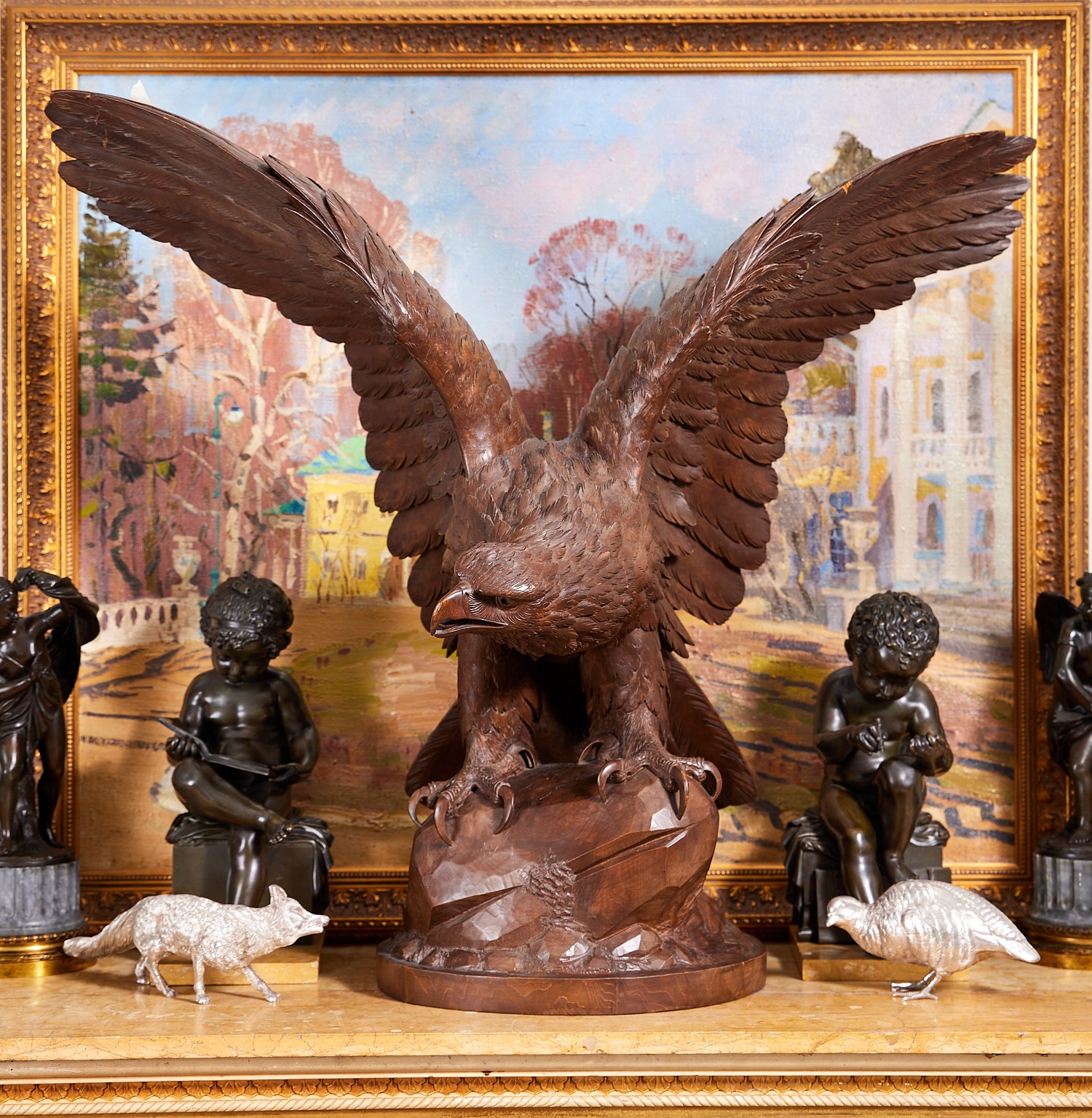 A MASSIVE EARLY 20TH CENTURY BLACK FOREST CARVED WOOD MODEL OF AN EAGLE