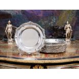 A SET OF TWELVE GEORGE III STERLING SILVER PLATES BY THOMAS ROBINS, LONDON