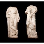 A PAIR OF 15TH CENTURY OR EARLIER ITALIAN MARBLE FIGURES OF MUSES CLIO AND TERPSICHORE