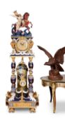 A MONUMENTAL PORCELAIN AND ORMOLU FLOORSTANDING CLOCK