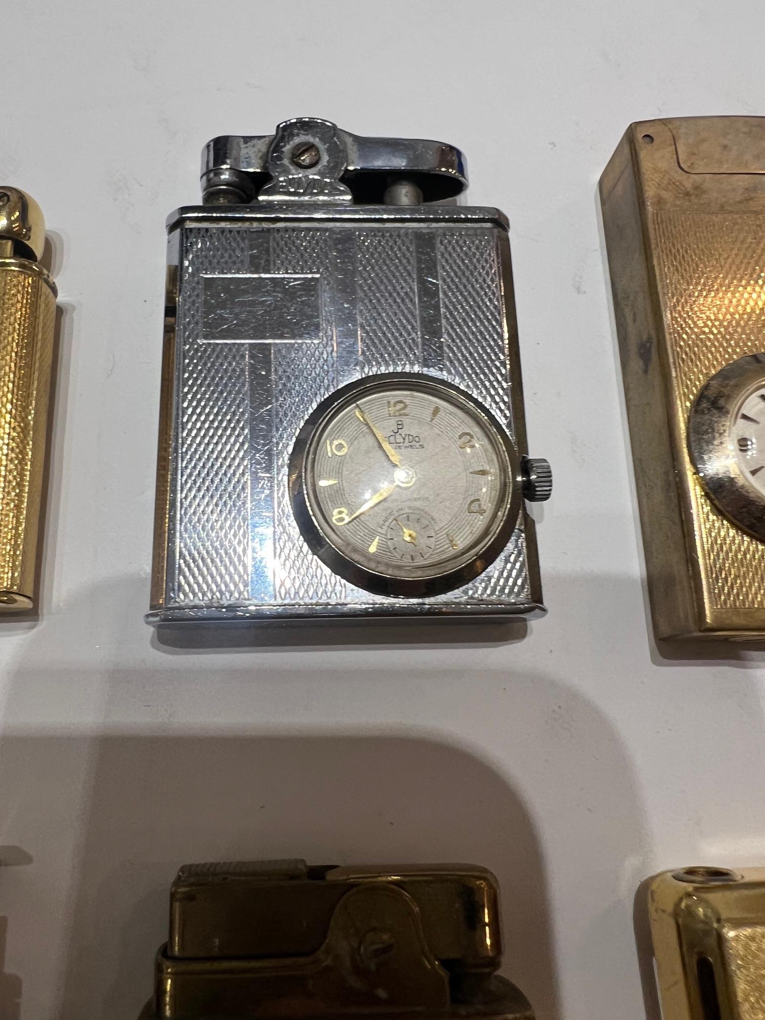 TEN NOVELTY LIGHTERS, FIVE WITH WATCH MOVEMENTS - Image 4 of 9