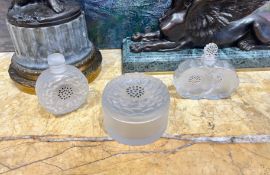 LALIQUE: TWO FROSTED GLASS PERFUME BOTTLES AND A DRESSING TABLE JAR
